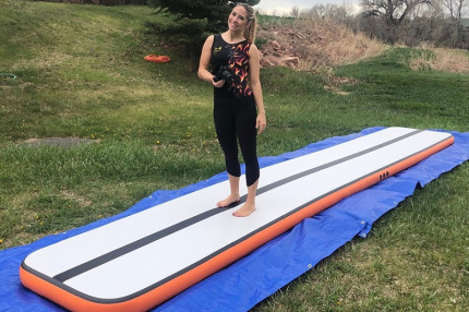 blue inflatable air track gym mat