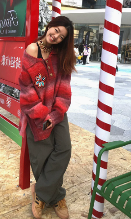 Red knitwear with gradient stripes